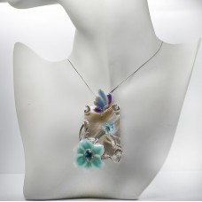 Pendant with flower and butterfly