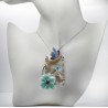 Pendant with flower and butterfly