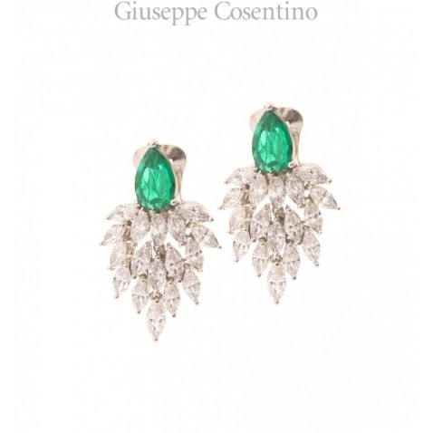 Ultima edizione, white earring drops and green plant