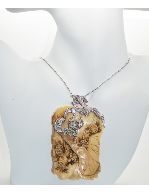 gold pendant with ivory and bright