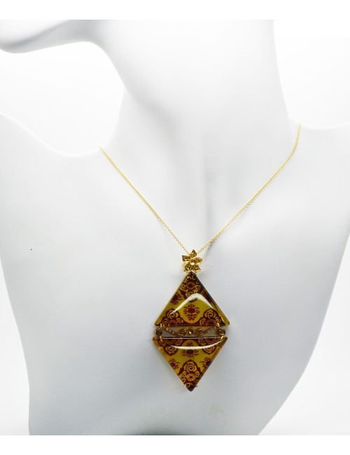 gold pendant with amber and diamonds
