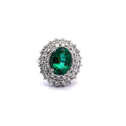 Anello con Smeraldo Ovale e Doppio Contorno di Diamanti Naturali in Oro Bianco