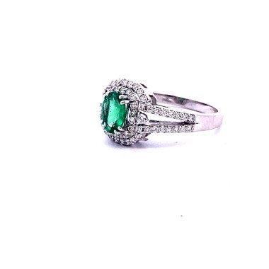 Anello con Smeraldo Ovale e Doppio Contorno di Diamanti Naturali in Or