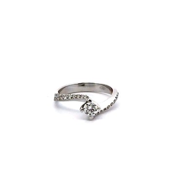 Anello con DIAMANTE NATURALE centrale certificato IGI 0,30 ct D VVS2 e diamanti laterali 0,39 ct