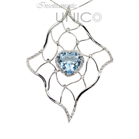 White gold pendant with blue topaz and brillant White gold pendant with blue topaz and brillant