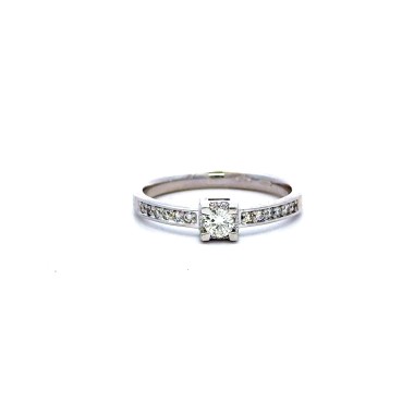 Anello con Diamante Centrale 0,15 ct e Diamanti sul Gambo 0,15 ct F VS