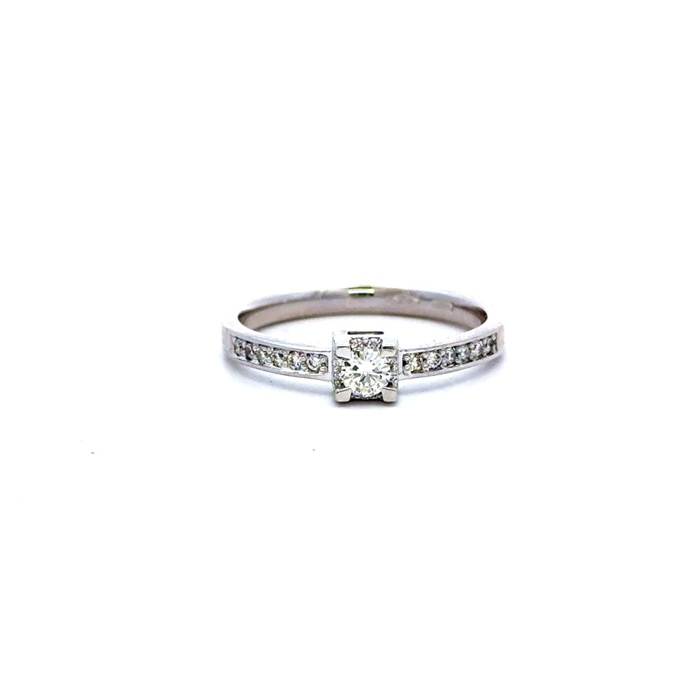 Anello con Diamante Centrale 0,15 ct e Diamanti sul Gambo 0,15 ct F VS