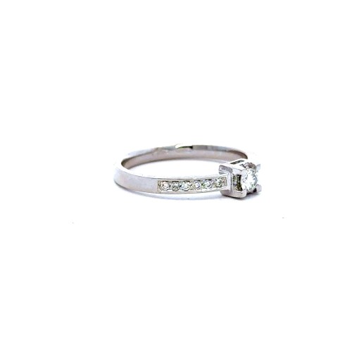 Anello con Diamante Centrale 0,15 ct e Diamanti sul Gambo 0,15 ct F VS