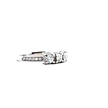 Anello Trilogy con Diamante 0,54 ct e Diamanti sul Gambo 0,20 ct F VS