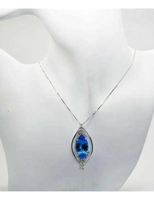 gold pendant with blue topaz and diamonds