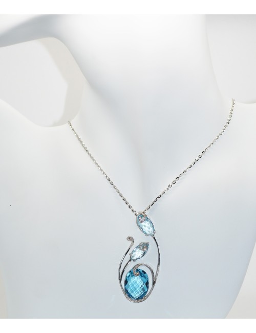 Gold pendant with topaz and diamonds